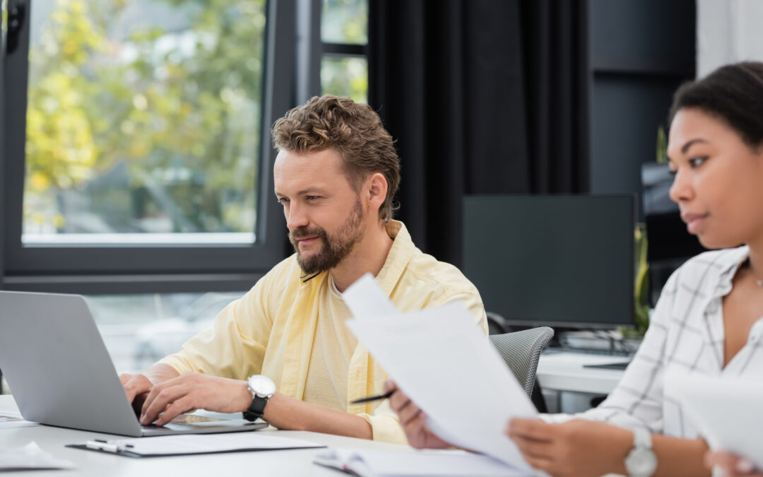 Man on computer doing blended learning creation