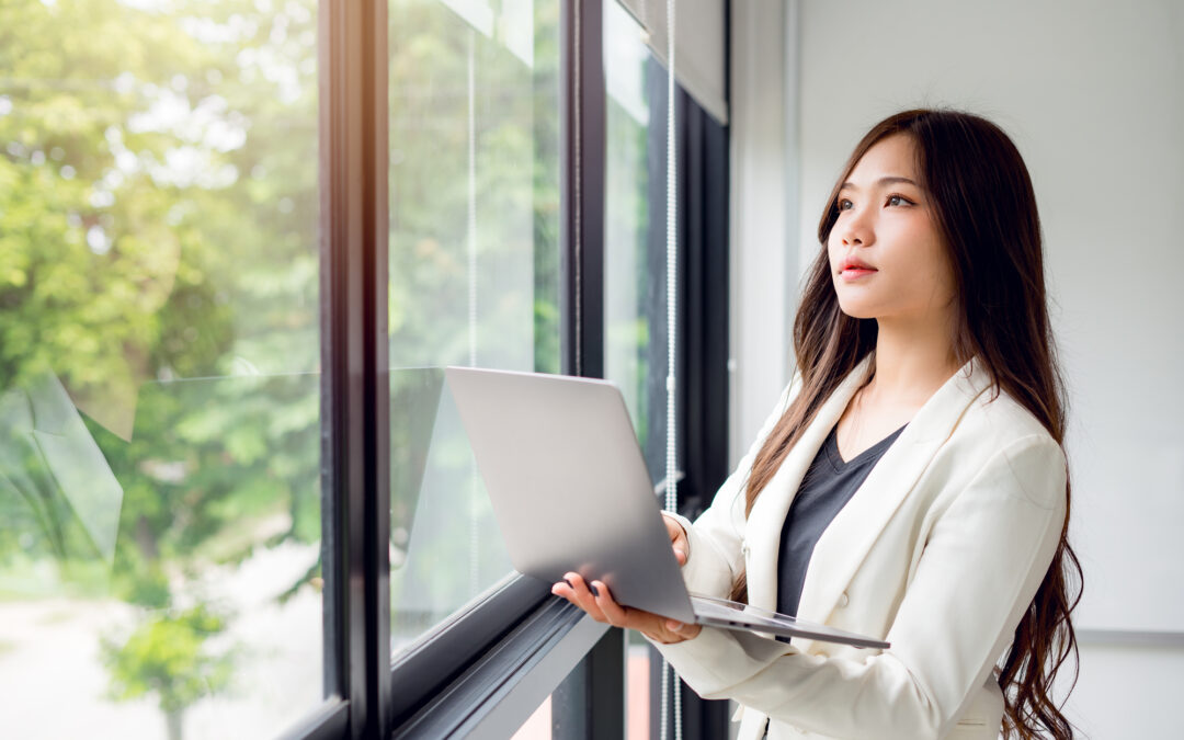 Future of work woman looking out window